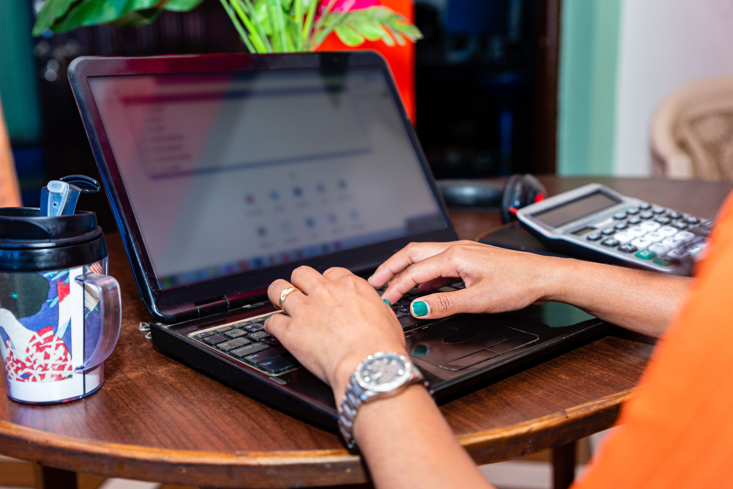 Woman working on her laptop.