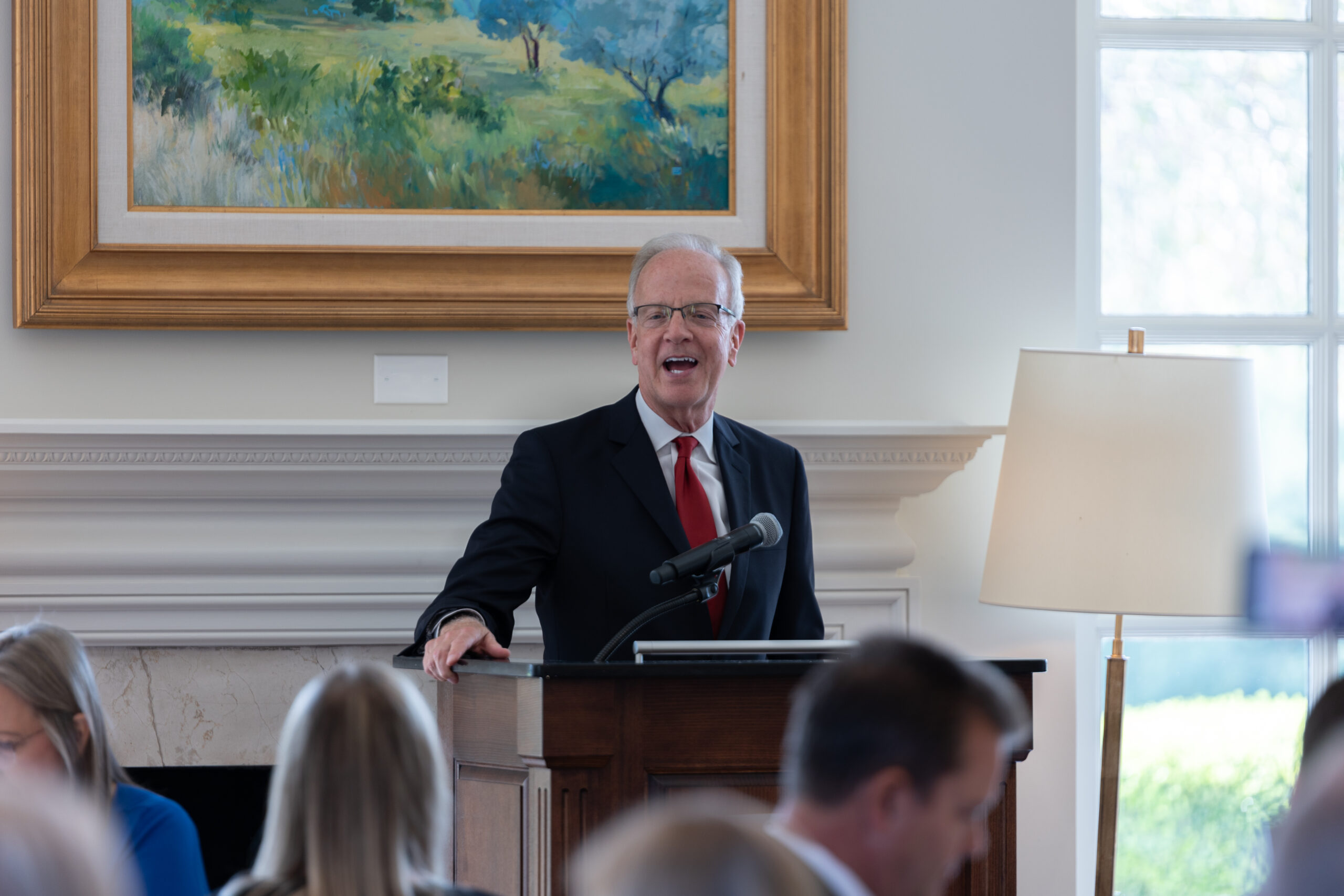 Image description: Senator Jerry Moran speaks at a podium to a room of Kansas City REALTORS.