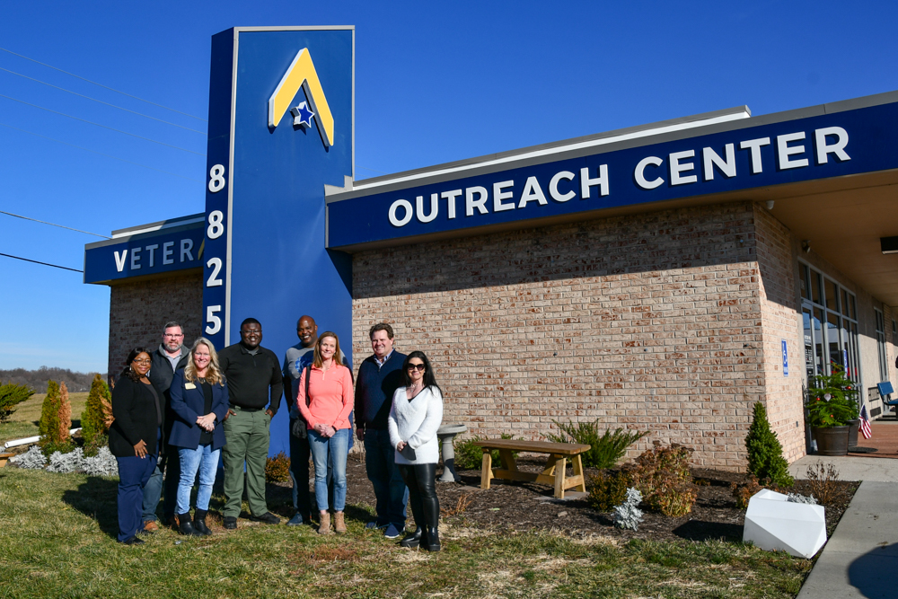 Image description: DEI volunteers pose outside of the VCP Outreach Center in Kansas City.