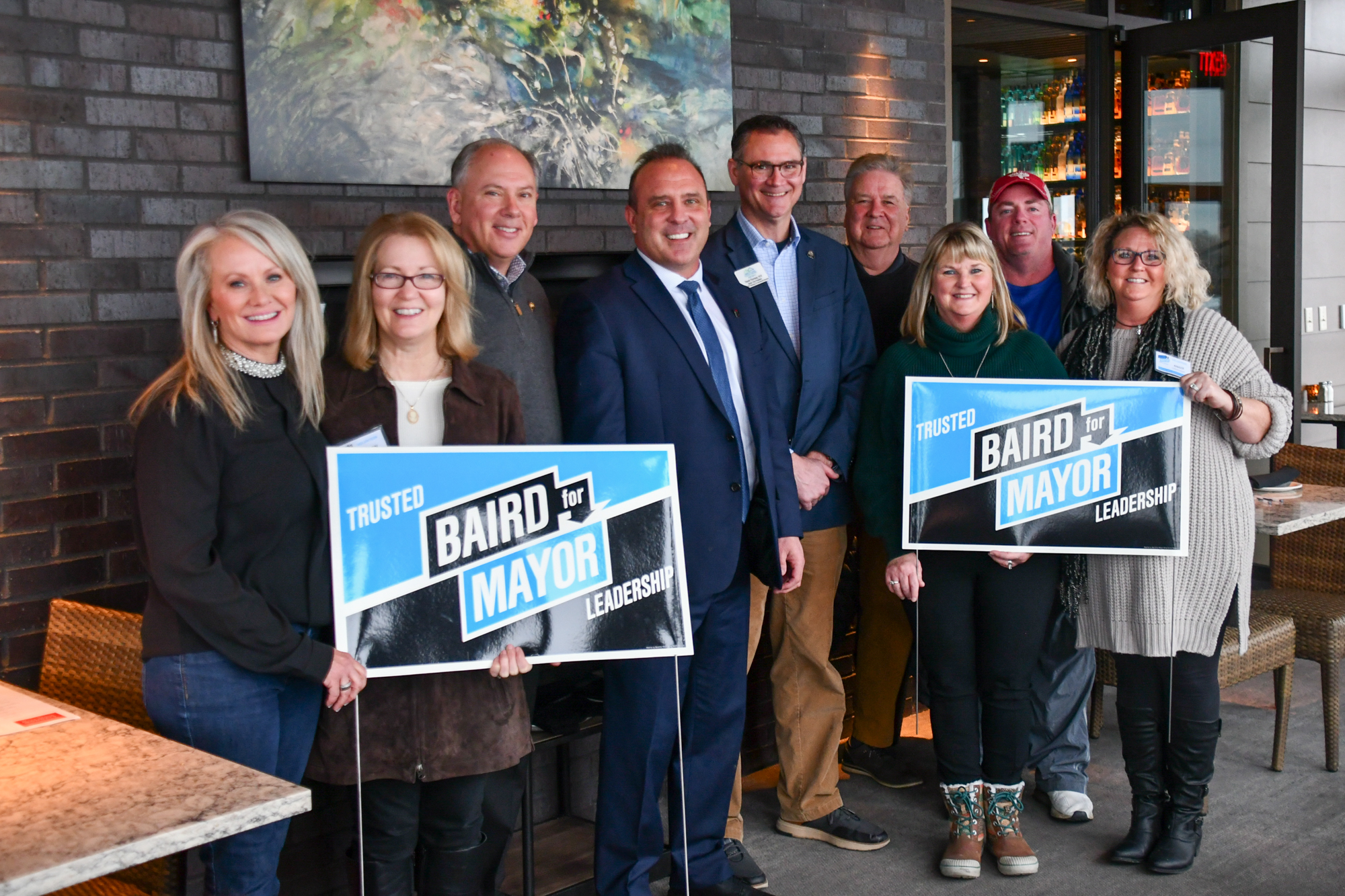 Image description: Bill Baird poses with fellow KCRAR members at recent event.