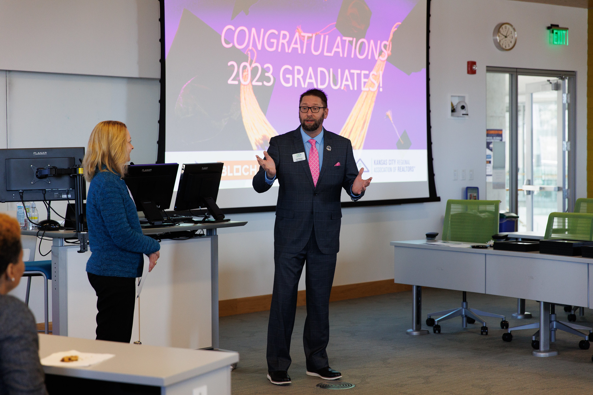 Image description: 2023 Heartland MLS President Kyle Niemann addresses the graduates.